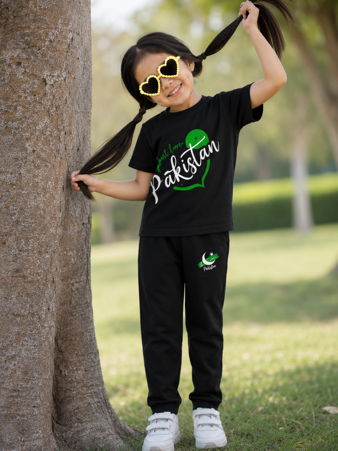 Girl wearing 14 August Azadi T-Shirt and Trouser Set with Pakistan Independence Day design