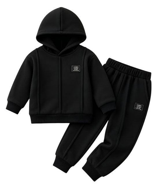 Close-up of 3 stripe detail on black kids fleece tracksuit