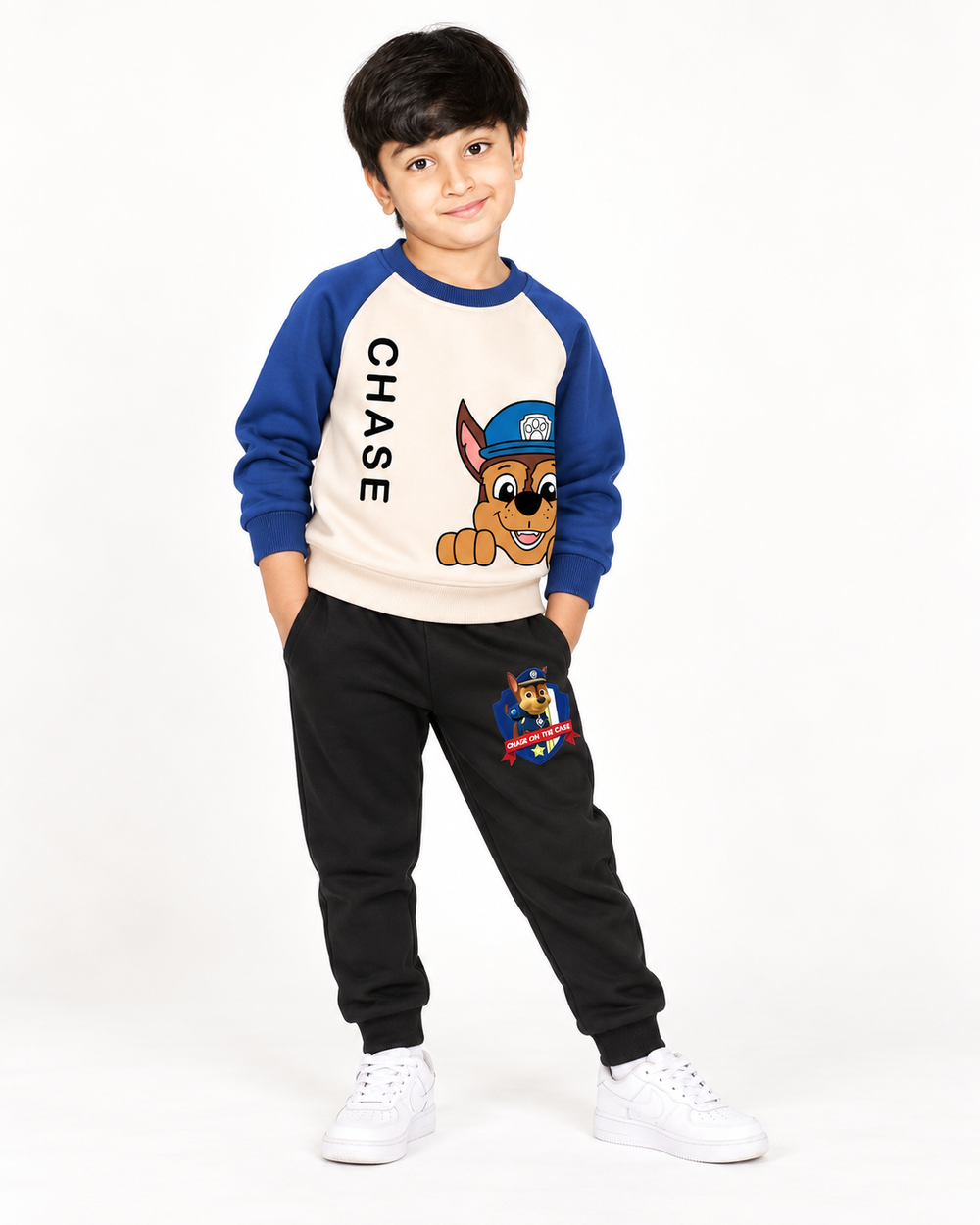 Boy wearing Chase themed kids sweatshirt and black jogger tracksuit set by Mini Wear